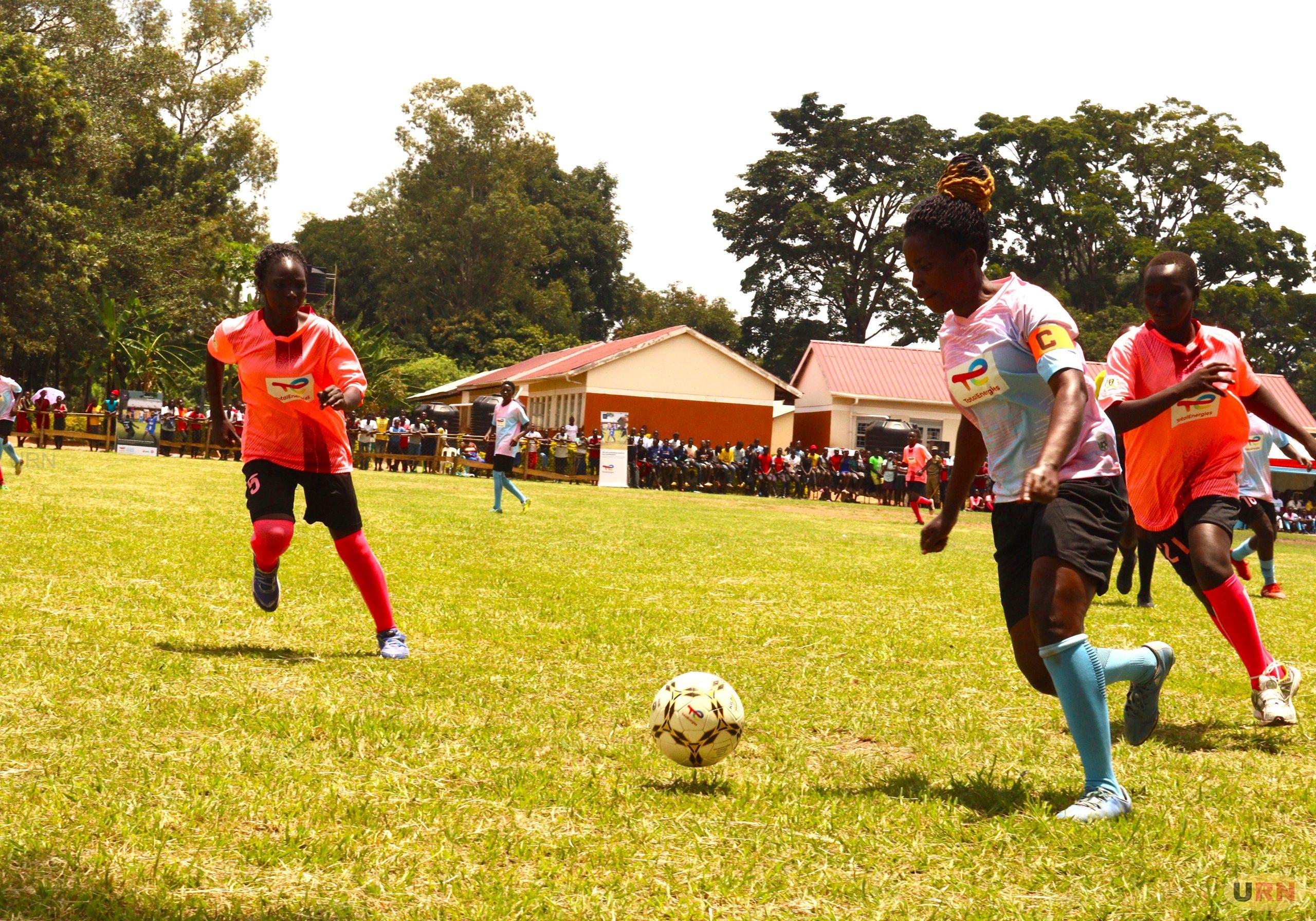 Irene Agenorwot, Queen Lioness Football Club Captian dribbles the ball during Saturday's Total Energies E&P openning football tournament in Anaka Town Council in Nwoya District
